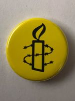 Button Amnesty International Logo