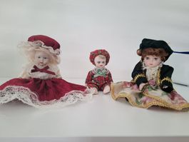 3 bambole di porcellana