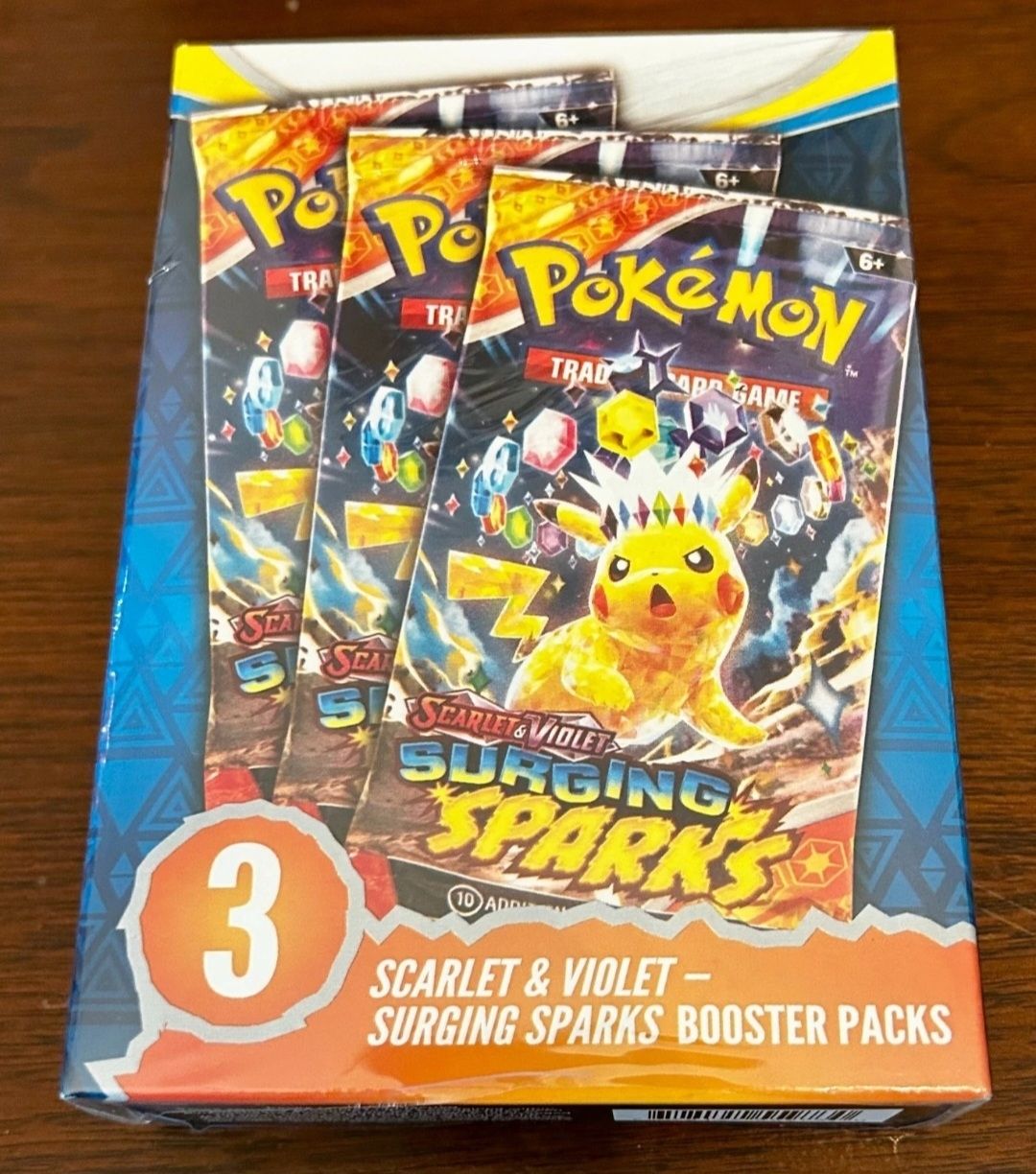 Pokémon Carte collezionabili: Pokemon Scarlet & Violet - Surging Sparks - 3 pacchetti – Nuovo e nell'imballaggio originale da Winterthur venduto da VZ123