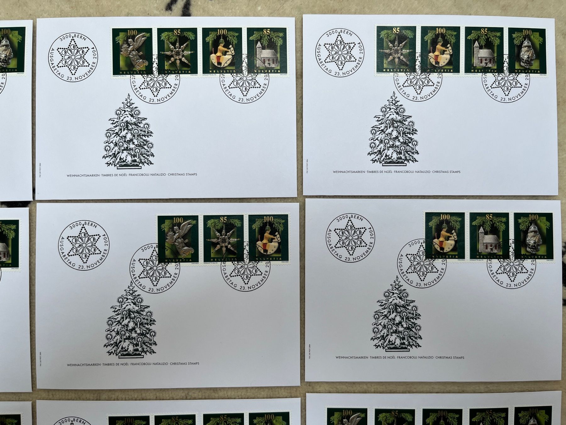 Tutti i francobolli: FDC Christbaumschmuck 2004 illustriert ohne Adresse – Nuovo e nell'imballaggio originale da Zürich venduto da Alain-Phila 2