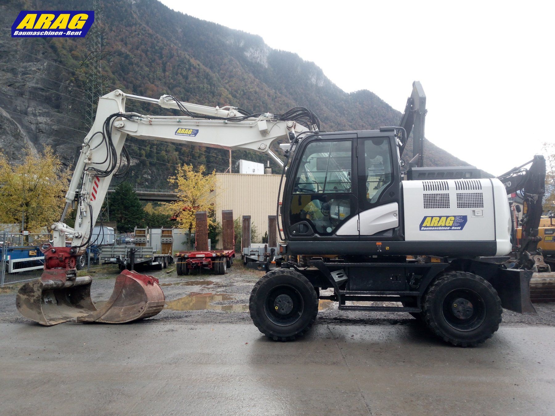Hitachi Escavatori: Hitachi ZX 140 W-6 Pneubagger – Usato da Hasle LU venduto da Arag08