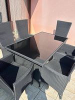 Tavolo e poltrone in Rattan