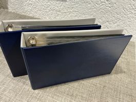 2x  Ordner, blau, für FDC Briefe mit je  20 Sichtmappen.