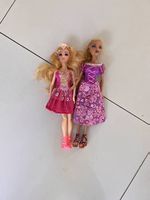 Lot 2 Barbies princesses