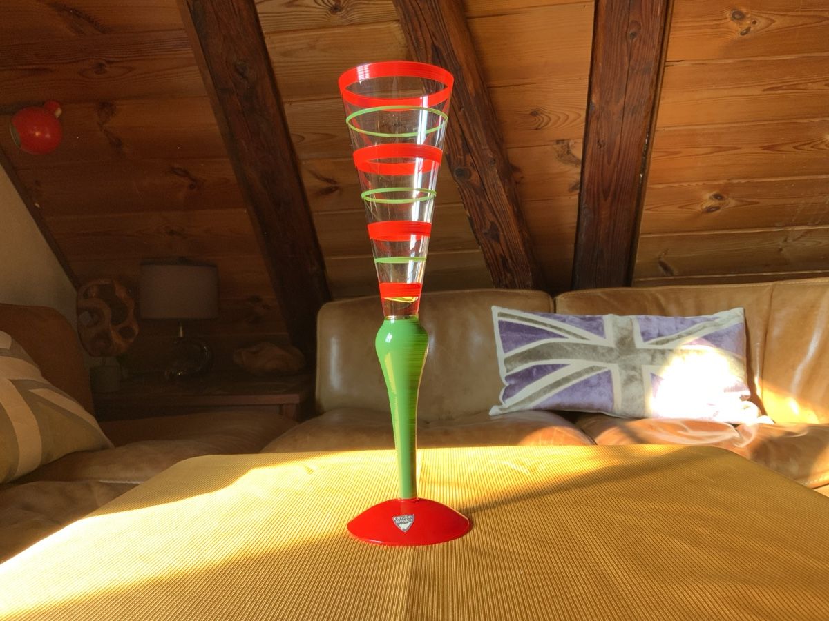 A SET OF 4 CLOWN CHAMPAGNE GLASSES BY ANNE NILSSON ORREFORS