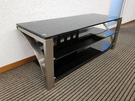 Meuble TV en inox brossé et verre fumé. Fabriqué en Italie