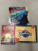 3 jeux de société - Bioviva, The Island, Catan Duel