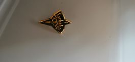 Pin l'arbalète, pub Genève 