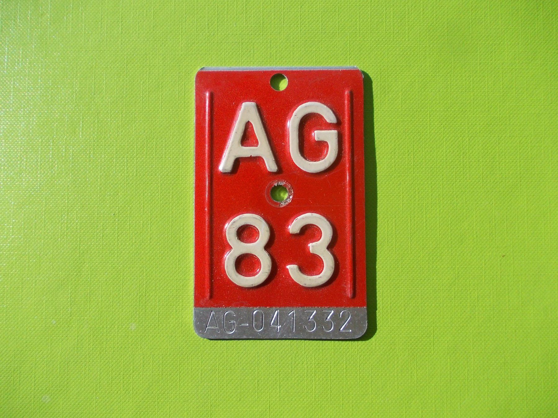 Insegne: Velonummer / Fahrradnummer AG 83 – Usato da Gsteigwiler venduto da HORMIGA21