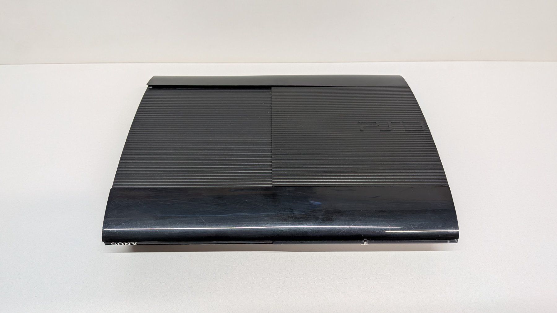 Sony Konsolen: PlayStation 3 Super Slim mit 2 Controller – Gebraucht aus Menziken von mame18 3