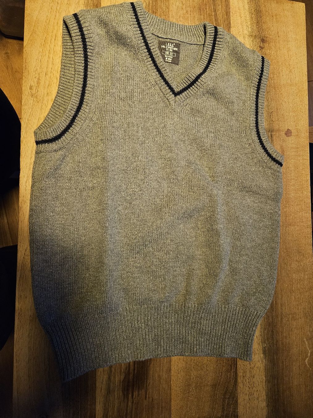 Altro abbigliamento per bambino: Grauer Pullunder, Grösse 122, – Usato da Spiez venduto da ann_y7bb