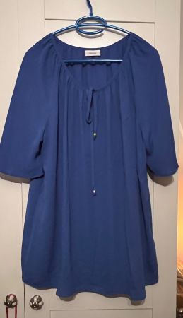 • Bluse mit Oberteil •