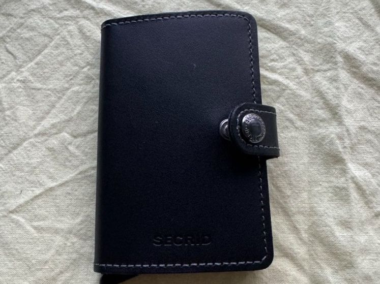 Secrid Brieftaschen: Secrid Miniwallet schwarz – Gebraucht aus Zürich von Eisenbahnenliebhaber