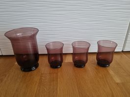4x violette Windlichter