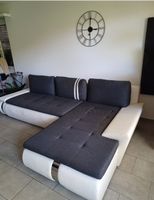 Ecksofa mit Schlaffunktion grau weiss 