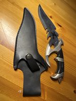 Couteau de chasse unique avec étui, parfait pour l'aventure!