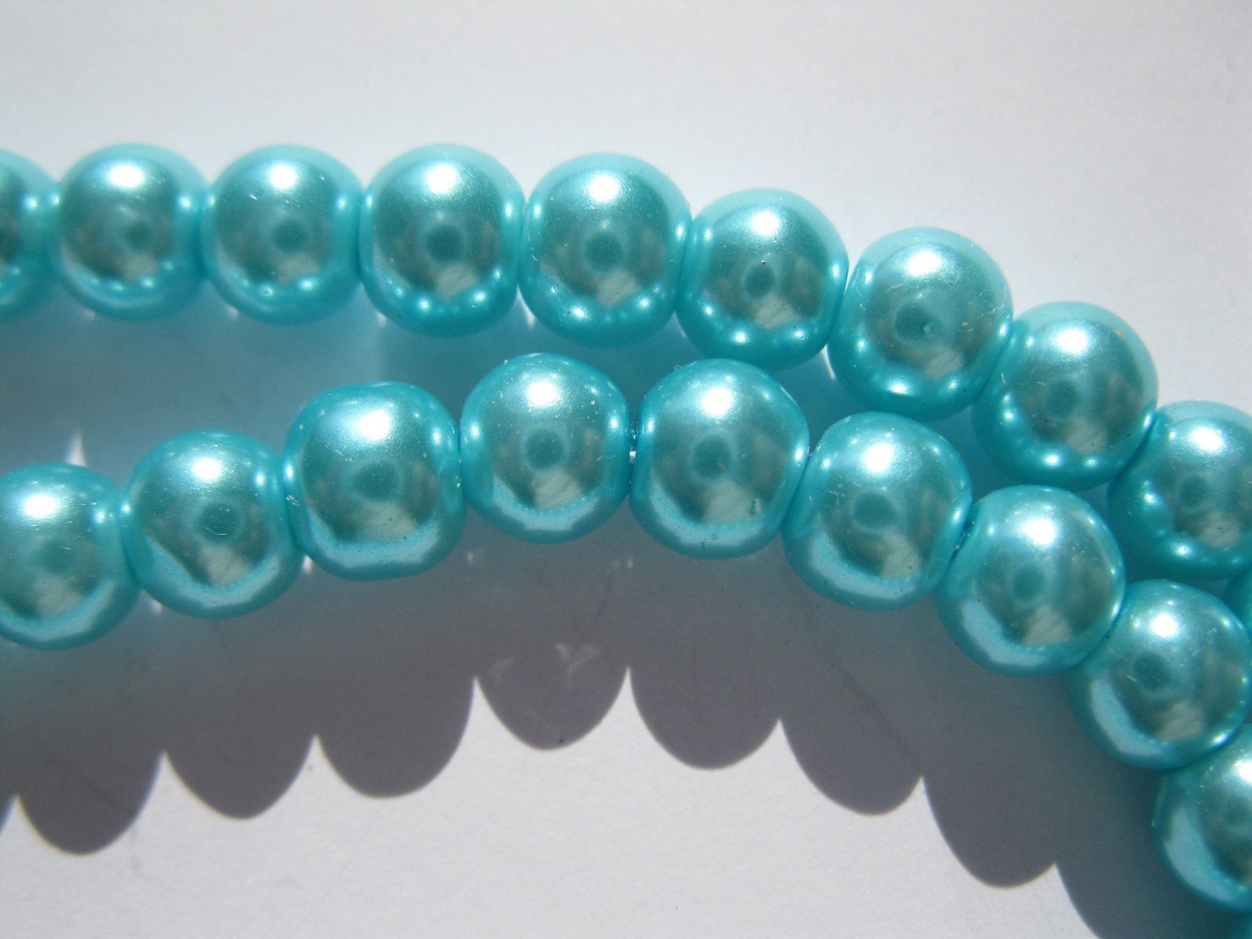 Perle (finte): 1 Strang Glasp. Perlmutt 6mm, türkis – Nuovo e nell'imballaggio originale da St. Margarethen TG venduto da LuanaKa 1