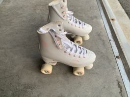 Patin à roulettes Oxelo, taille 39, avec protections.