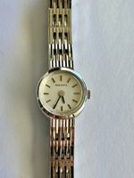 Élégante montre Rodania vintage pour femme, bracelet acier