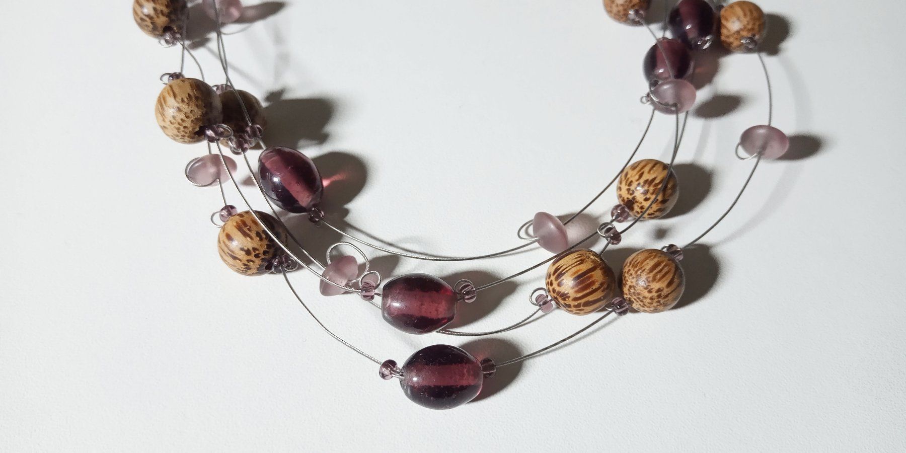 Catenine: Wunderschöne Designer Kette mit Holzperlen zu Nile – Usato da St. Gallen venduto da Hereplaysmusic