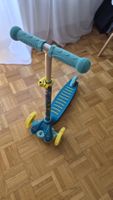 Kinder Roller dreirädrig, mit leuchtenden Rädern.