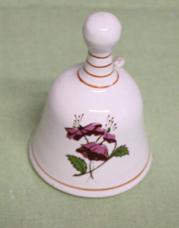 Campanacci mucche: Glocke Keramik weiss - rot – Usato da Flüelen venduto da Diversicum-Shop