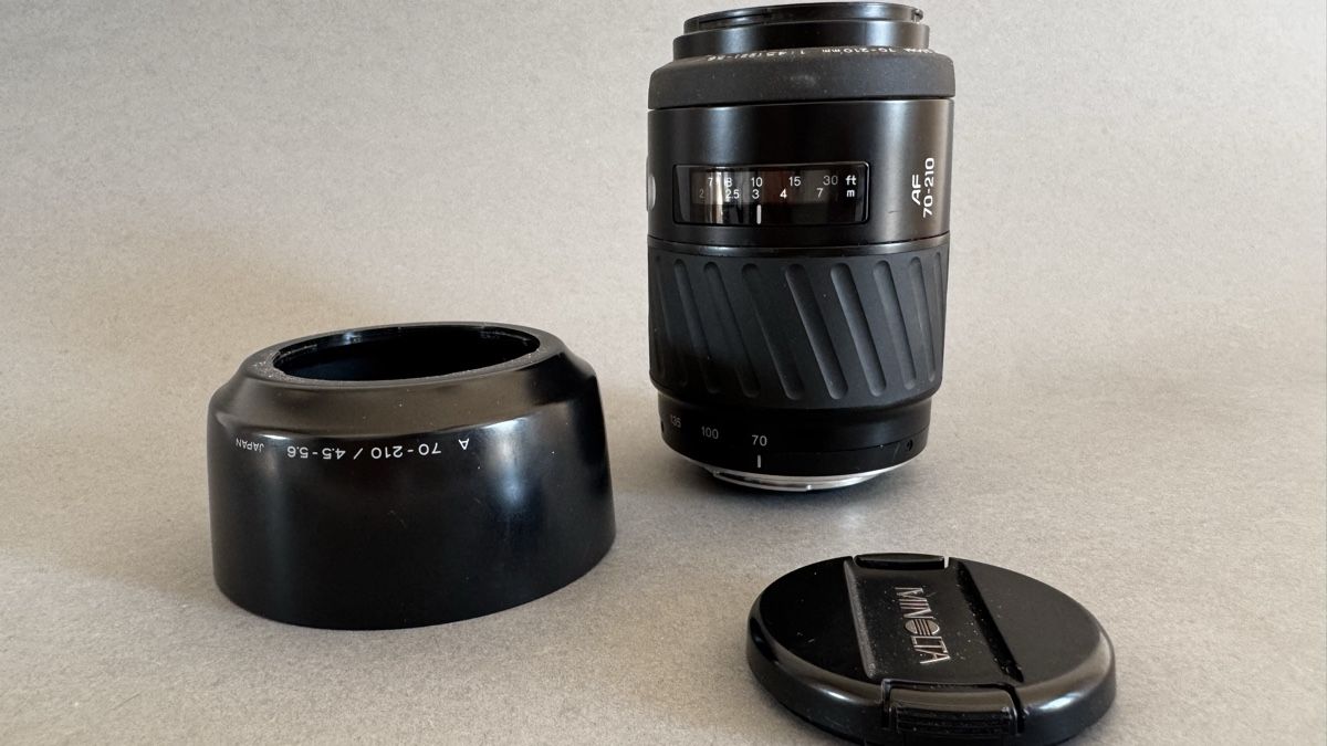 Minolta Objektive: Objectif Minolta 70-210 mm + pare-soleil – Gebraucht aus Lausanne von FAST-FAST 1