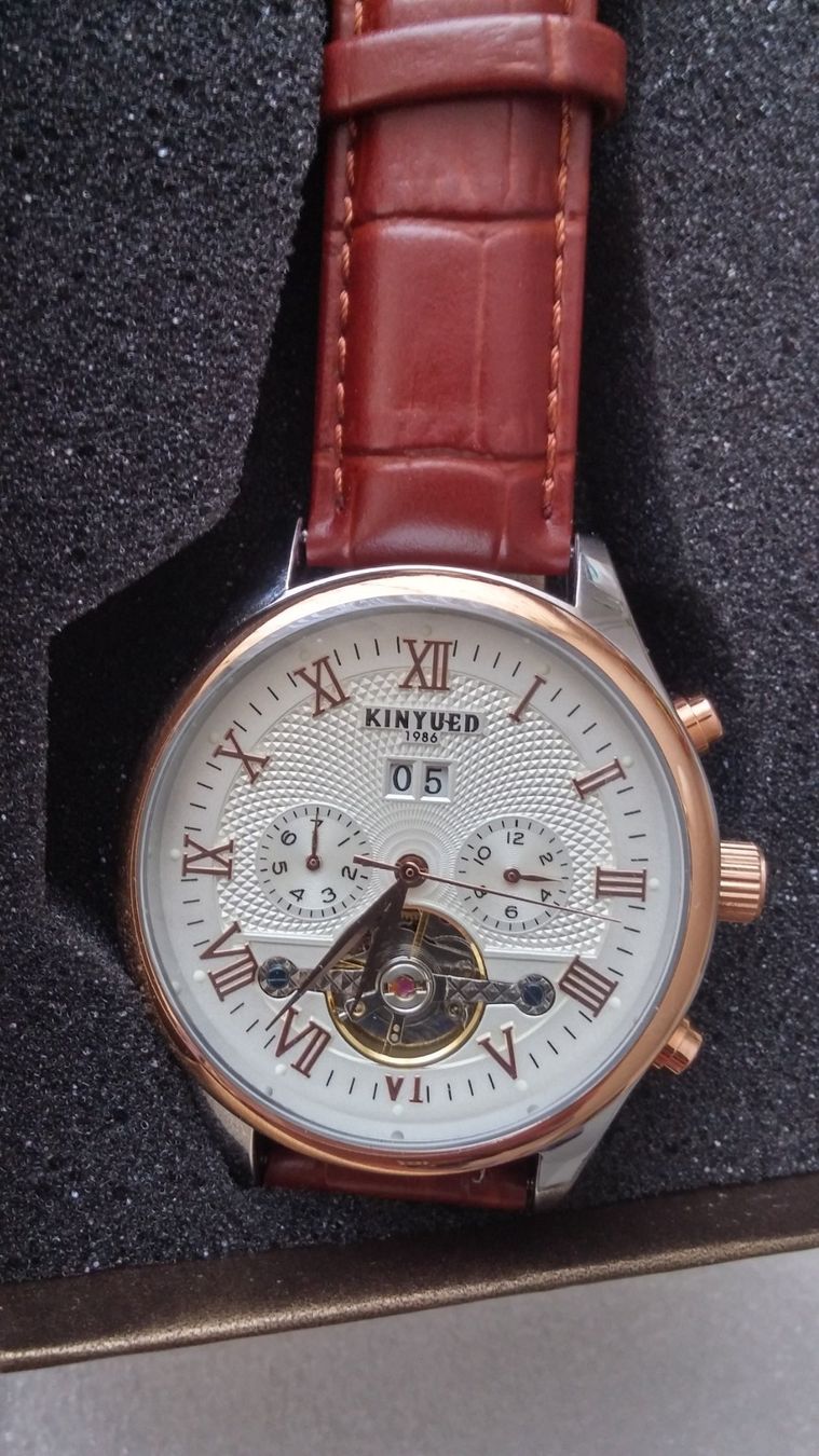 Orologi: Kinyued Automatik elegant Herrenuhr – Nuovo e nell'imballaggio originale da Zürich venduto da sendbad