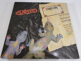 Cursed – Rhapsody