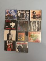 Lot de 11 CD audio artistes variés état acceptable