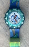 Montre Swatch bleu motif floral état comme neuf
