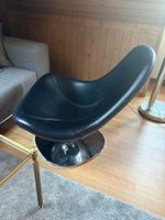 Poltrona girevole nera design base cromata usata