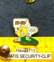 OLYMPIA PIN m&m TRACK & FIELD GOLDIG