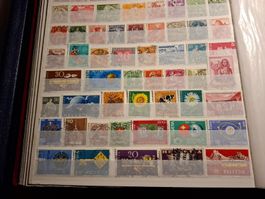 76 Schweizer Briefmarken mit Stempel "Chur"