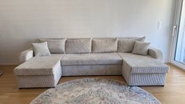 U-Sofa mit Schlaffunktion in Cord beige gebraucht