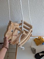 süsse Babyschaukel für den Innenbereich
