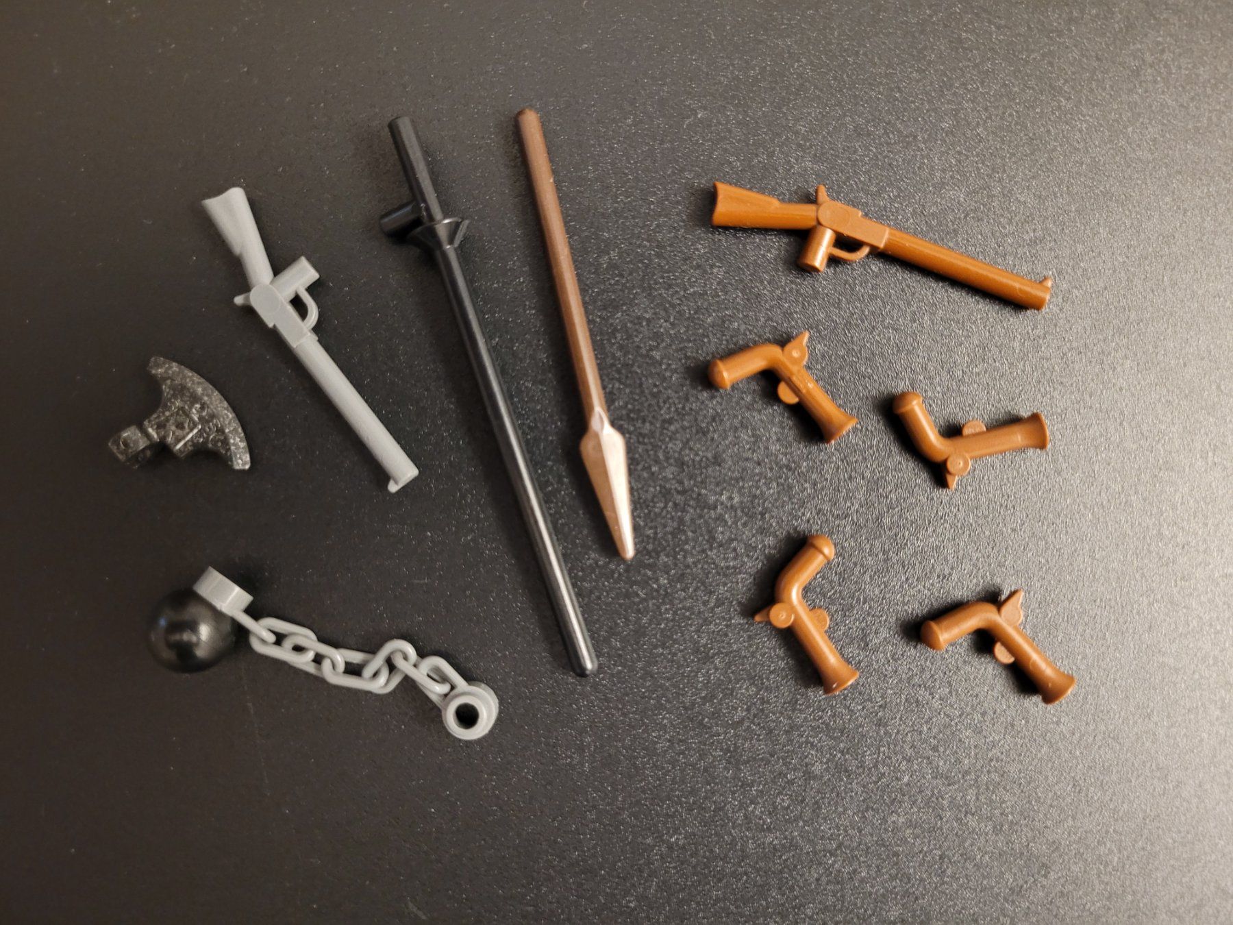 Lego Spielzeuge: 60: Lego Minifiguren Waffen – Gebraucht aus Buttikon SZ von