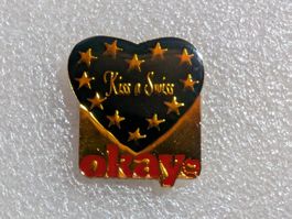 Ansteckpin 31: Okay's - Kiss a swiss