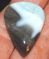 Cabochon L-8422 – Blauer Owyhee Opal 33x23,5mm 33.85 Karat