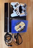 PlayStation 3 Konsole mit 2 Controllern und Spiel