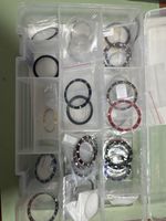 Lot lunettes de montre divers matériaux divers couleurs