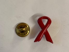 Pin's Ruban rouge de sensibilisation au sida -