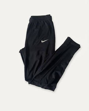 Pantalon de sport Nike noir taille M.   22 CHF.-
