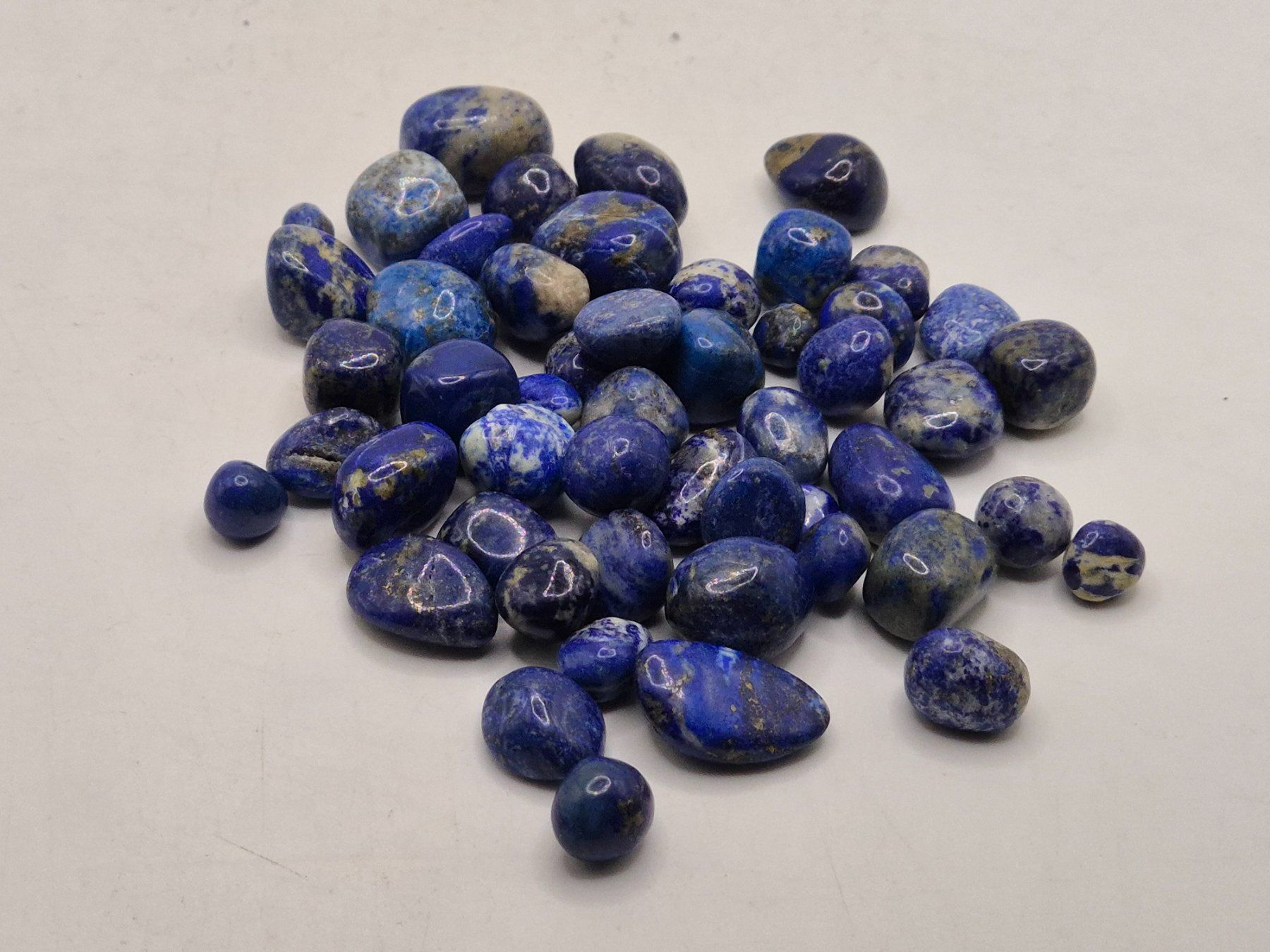 Minerali & Pietre curative: Trommelsteine Lapis Lapislazuli klein – Nuovo e nell'imballaggio originale da Winterthur venduto da LukasMineralienOase