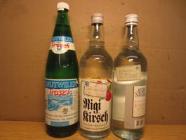 3 Fl. Destillate: Kirsch/ Träsch/ Kräuter. #1788