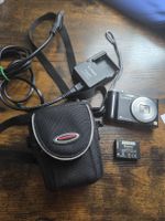 Panasonic Lumix DMC-ZX1 camera with accessories