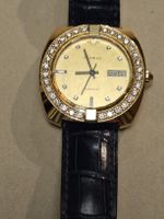 montre CENTURY or 18K et diamants, jour et date (36mm)