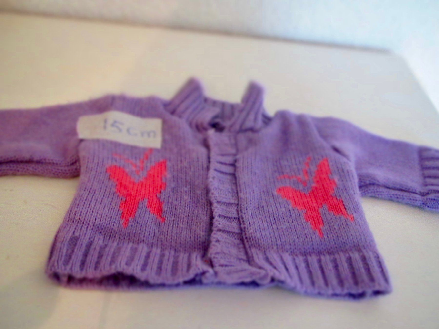 Bambole: JAQUETTE EN TRICOT POUR POUPEE – Usato da Murten venduto da Selliot