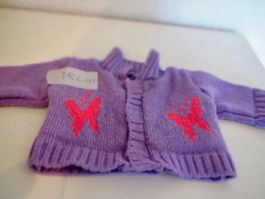JAQUETTE EN TRICOT POUR POUPEE