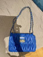 borsa blu elettrico